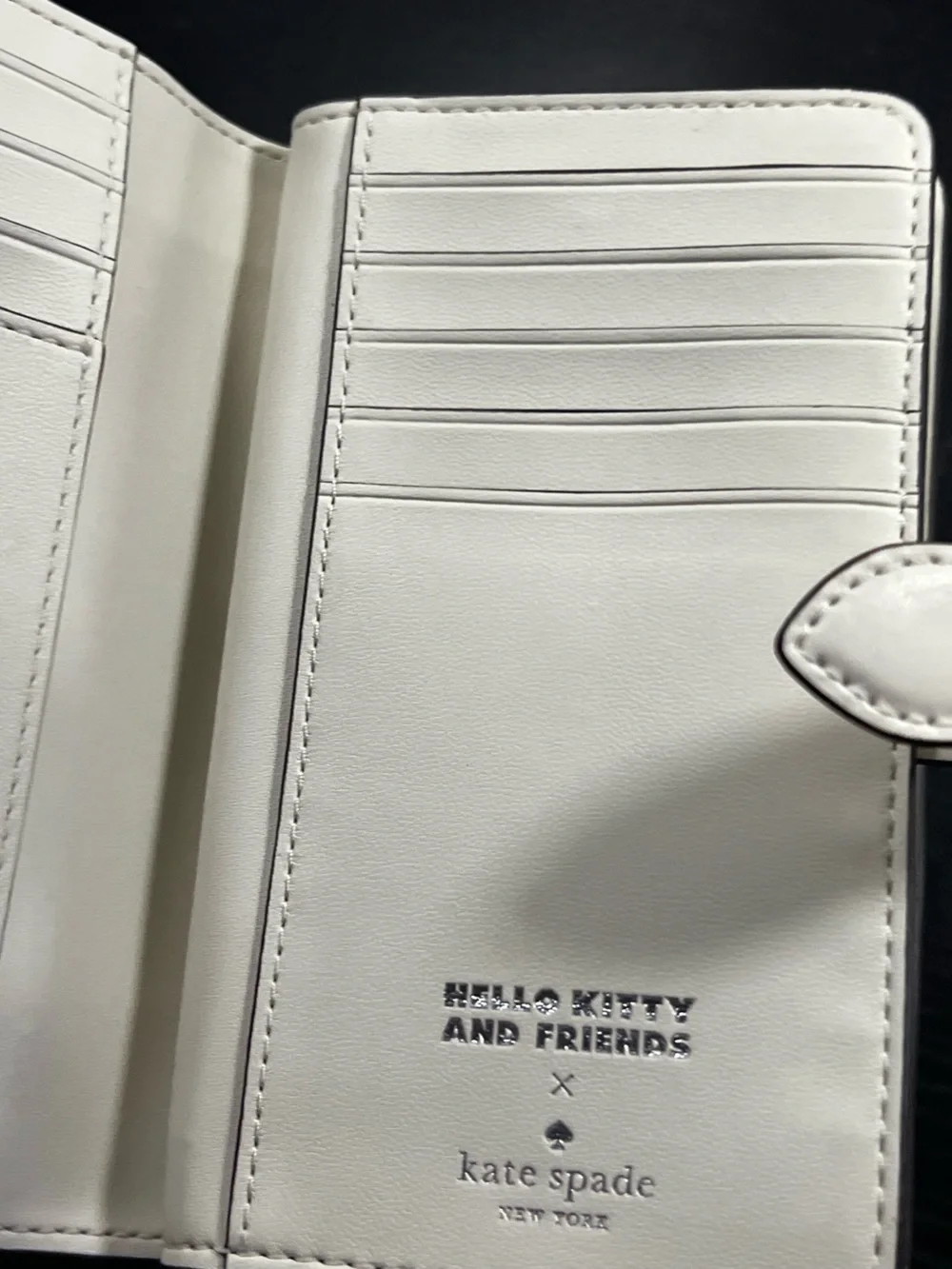 Hello Kitty and Friends x Kate Spade New York medium bifold wallet